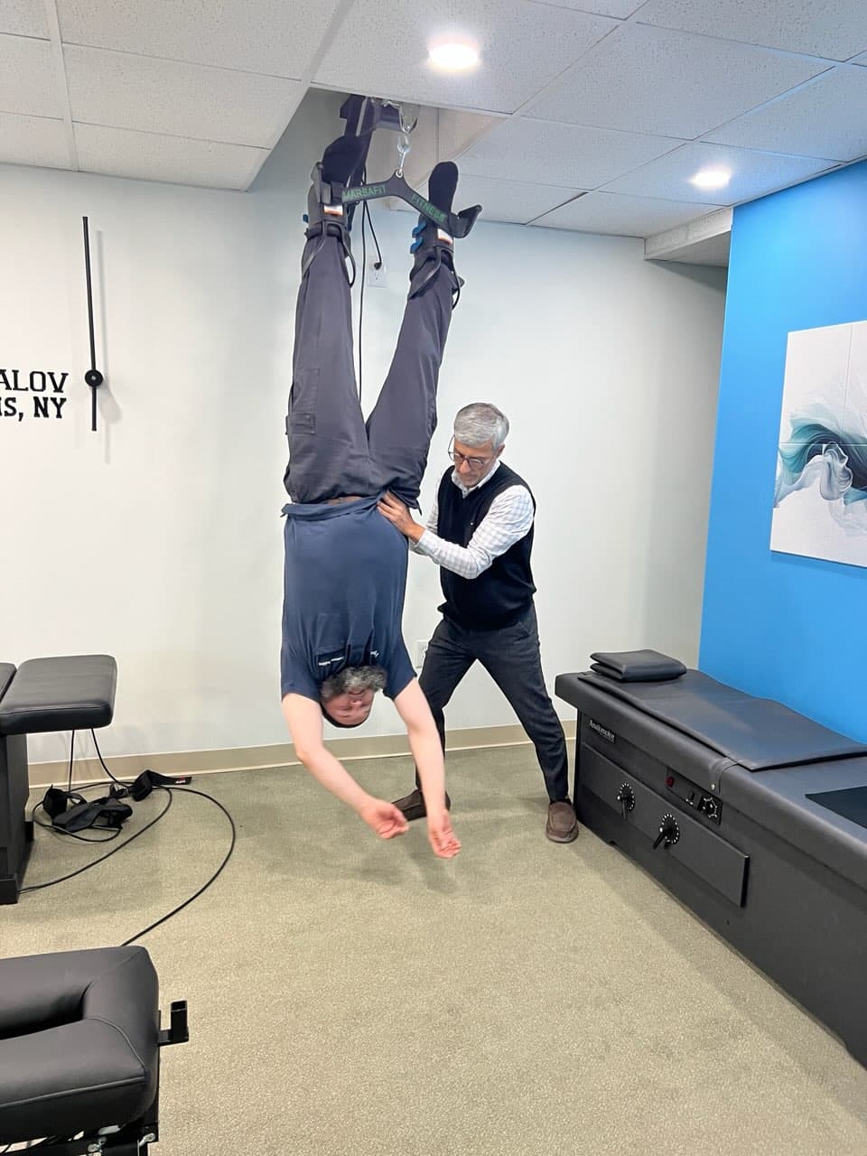 Person in relaxation or inversion therapy setting